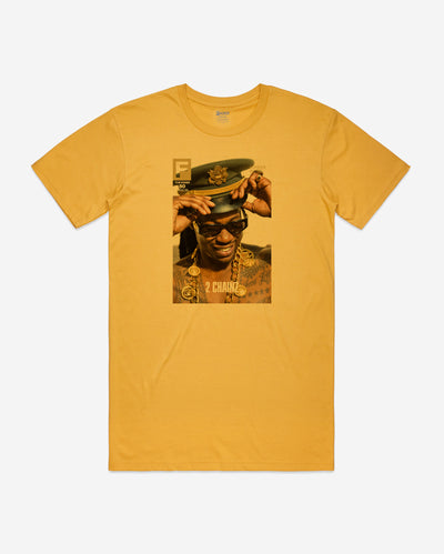 gold tee with 2 Chainz wearing hat, glasses, and gold necklaces on- the cover artwork of The FADER Issue 80.