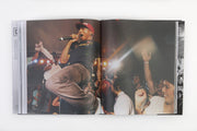 book opened to page of artist on stage